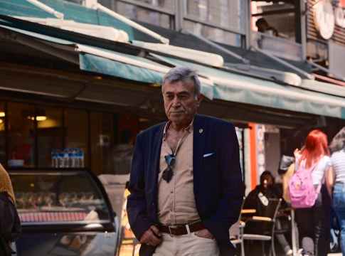 Man in a blazer on the street