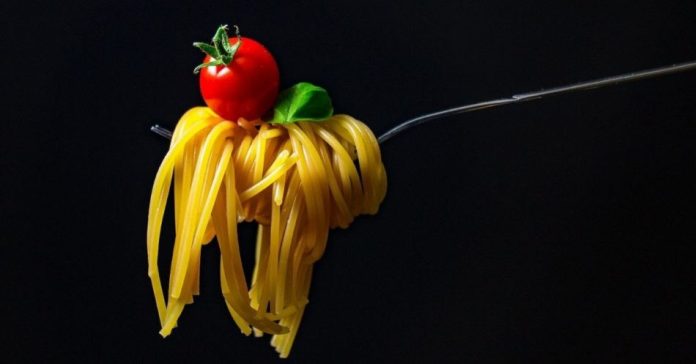 Satisfy your cravings with tomato coated Bucatini pasta