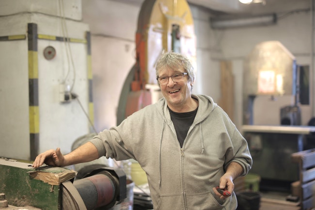 Helping a parent, in their workshop.